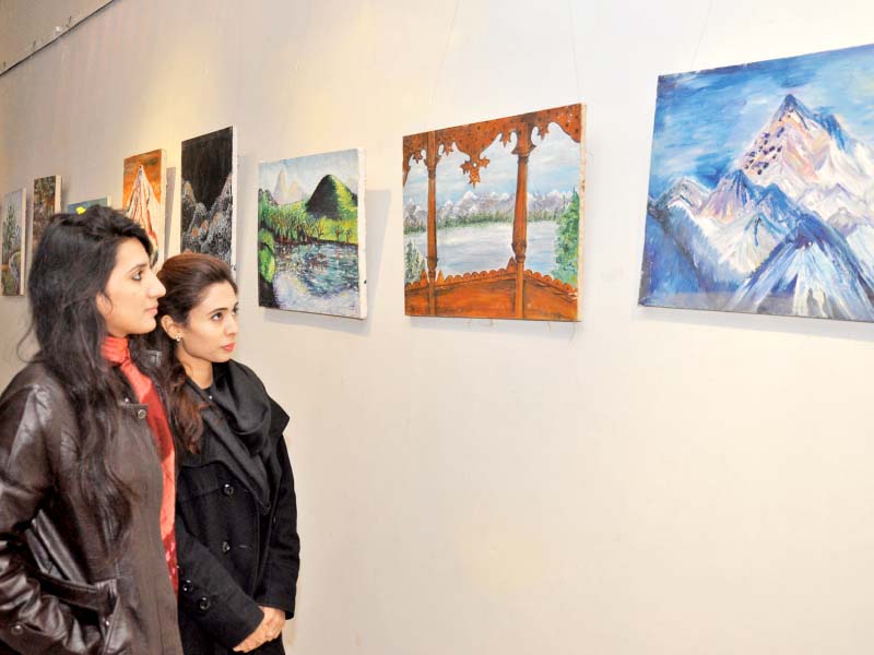 paintings about mountains on display at rac photo express