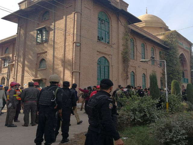 police and rescue workers stand outside the directorate of agriculture institute in peshawar on december 1 2017 photo reuters police and rescue workers stand outside the directorate of agriculture institute in peshawar on december 1 2017 photo reuters