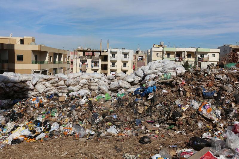garbage is seen piled near residential buildings in wadi al zayneh chouf district lebanon photo reuters