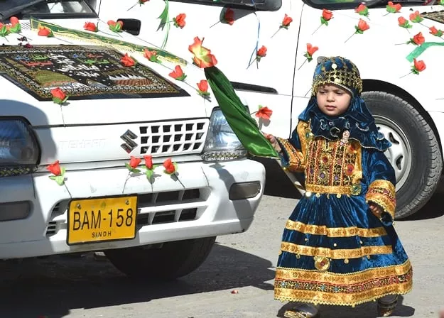 a girl takes part in a rally during celebrations marking eid e milad un nabi photo afp a girl takes part in a rally during celebrations marking eid e milad un nabi photo afp