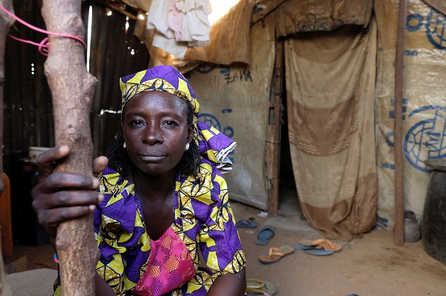 zainab bukar an internally displaced person living in bama camp nigeria poses for a picture in her shelter november 23 2017 picture taken november 23 2017 photo reuters