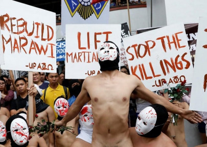 skin in the game philippine students protest duterte in naked run skin in the game philippine students protest duterte in naked run