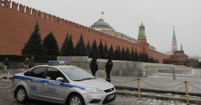 policemen stand guard in red square near the kremlin wall before the events dedicated to the upcoming final draw of the 2018 fifa world cup russia in moscow russia november 29 2017 photo reuters