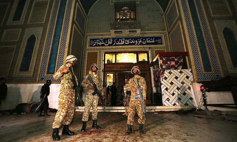 soldiers stand guard outside lal shahbaz qalandar 039 s shrine photo app