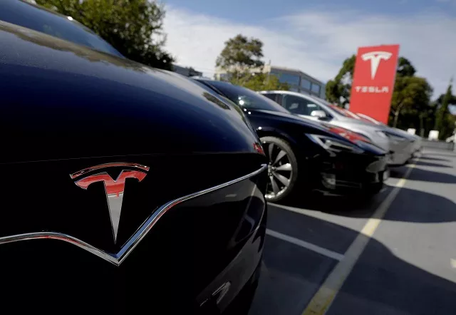 a tesla model x is seen alongside a model s at a tesla electric car dealership in sydney australia may 31 2017 photo reuters a tesla model x is seen alongside a model s at a tesla electric car dealership in sydney australia may 31 2017 photo reuters