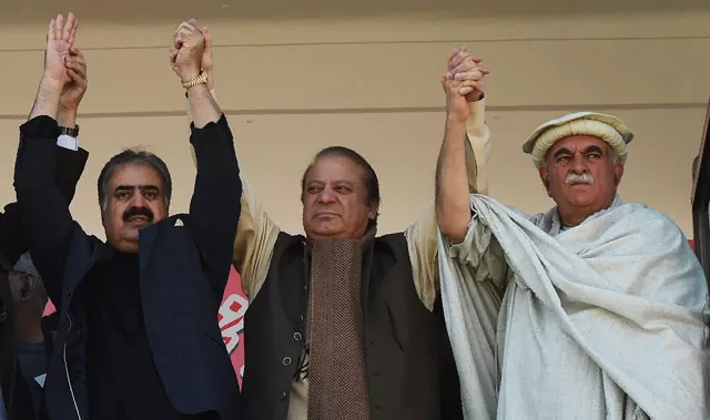former prime minister nawaz sharif joins hands in solidarity with balochistan chief minister sanaullah zehri and pakhtunkhwa milli awami chief mehmood achakzai at a public rally in quetta on november 2 2017 photo afp former prime minister nawaz sharif joins hands in solidarity with balochistan chief minister sanaullah zehri and pakhtunkhwa milli awami chief mehmood achakzai at a public rally in quetta on november 2 2017 photo afp