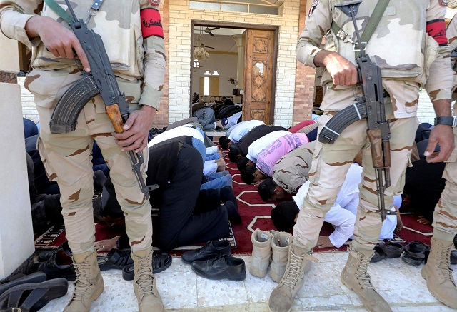 military secure worshippers outside al rawdah mosque during the first friday prayer after the attack in bir al abed egypt december 1 2017 photo reuters