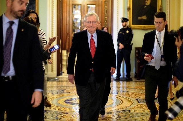 us senate majority leader mitch mcconnell r ky leaves the senate floor during debate over the republican tax reform plan in washington u s december 1 2017 photo reuters