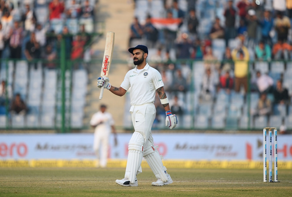 still unbeaten virat kohli remained on 156 with rohit sharma on six at the end of the day at the feroz shah kotla stadium in new delhi photo afp