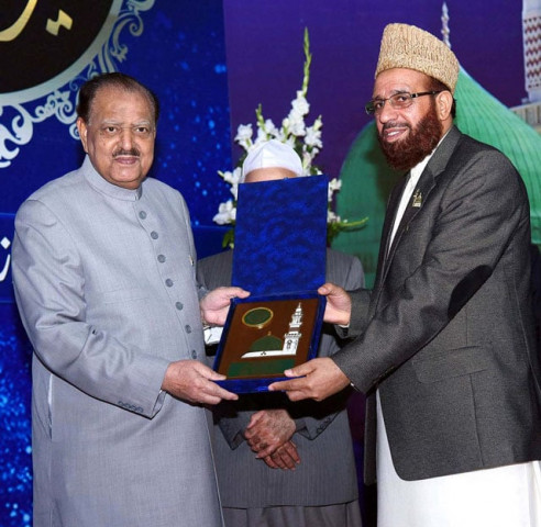 president mamnoon hussain presents a memento to minister for religious affairs sardar yousuf during the international saeerat un nabi pbuh conference in islamabad on saturday photo app president mamnoon hussain presents a memento to minister for religious affairs sardar yousuf during the international saeerat un nabi pbuh conference in islamabad on saturday photo app