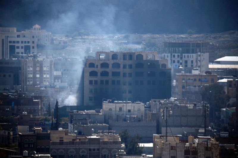 smoke billows in the yemeni capital sanaa during clashes between houthi rebels and supporters of yemeni ex president ali abdullah saleh photo afp