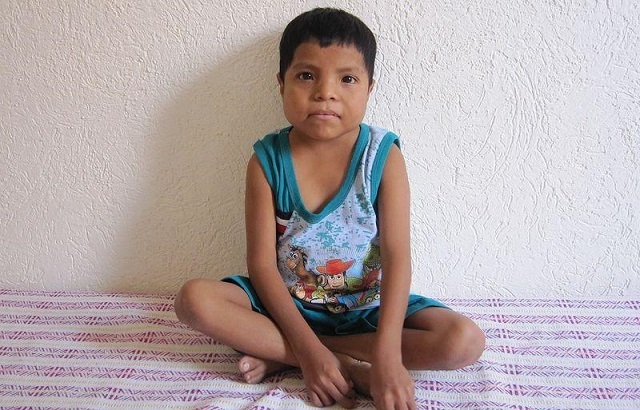 eduardo baltazar 13 poses for a photo he is the youngest person to undergo a kidney transplant in his village agua caliente mexico july 8 2017 photo reuters