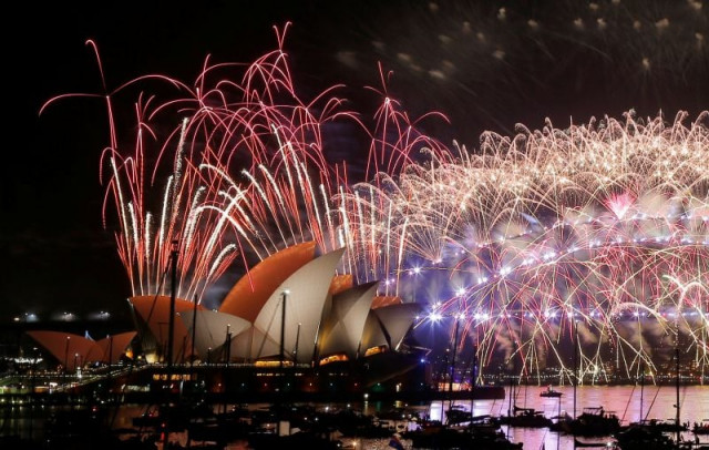 fireworks explode over the sydney opera house and harbour bridge in australia sydney photo reuters fireworks explode over the sydney opera house and harbour bridge in australia sydney photo reuters
