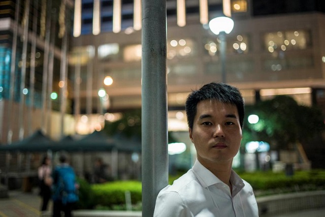 pro democracy activist sulu sou ka hou poses for photo on election day for the legislative assembly in macau china september 17 2017 picture taken september 17 2017 photo via reuters