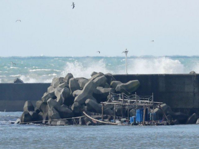 the badly decomposed remains of ten people have been found on japan 039 s coast across the sea from north korea photo afp