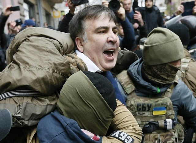 georgian former president mikheil saakashvili is detained by officers of the security service of ukraine conducting a search of his apartment in kiev ukraine december 5 2017 photo reuters