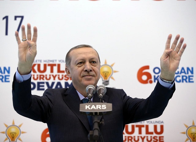 turkish president tayyip erdogan greets his supporters during a meeting of his ruling ak party in kars turkey december 2 2017 photo via reuters