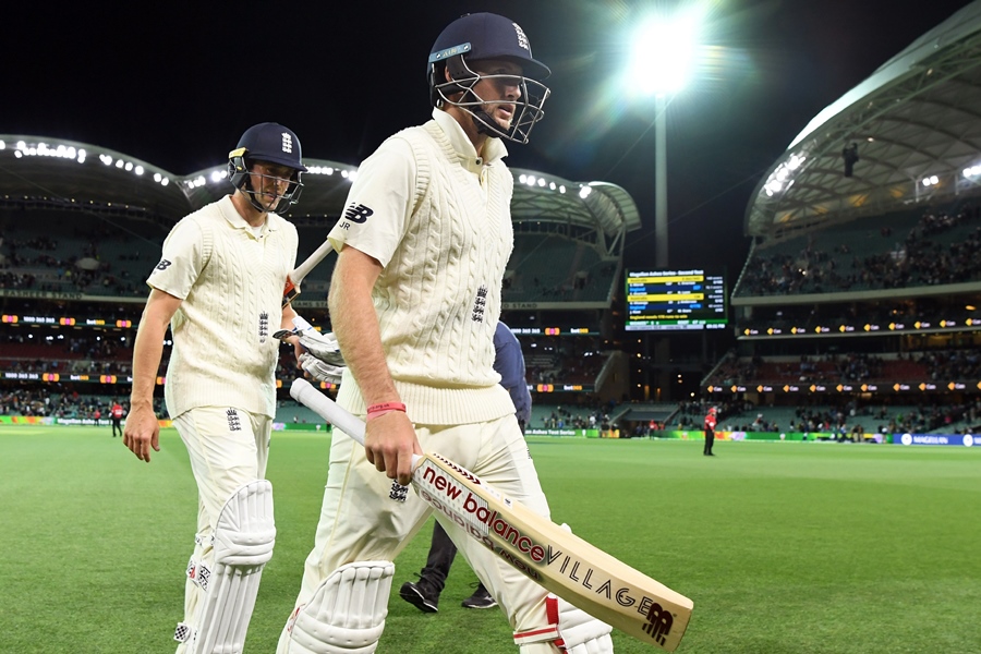 england 039 s batsmen joe root and chris woakes l walk off undefeated at stumps against australia on the fourth day of the second ashes cricket test match in adelaide in december 5 2017 photo afp