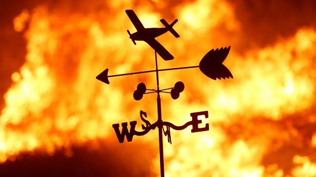 a weather vane is pictured on a ranch during the creek fire in the san fernando valley north of los angeles in sylmar california u s december 5 2017 photo reuters