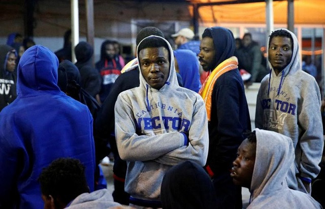 migrants wait at mitiga airport before their voluntary return to their countries east of tripoli libya december 5 2017 photo reuters migrants wait at mitiga airport before their voluntary return to their countries east of tripoli libya december 5 2017 photo reuters