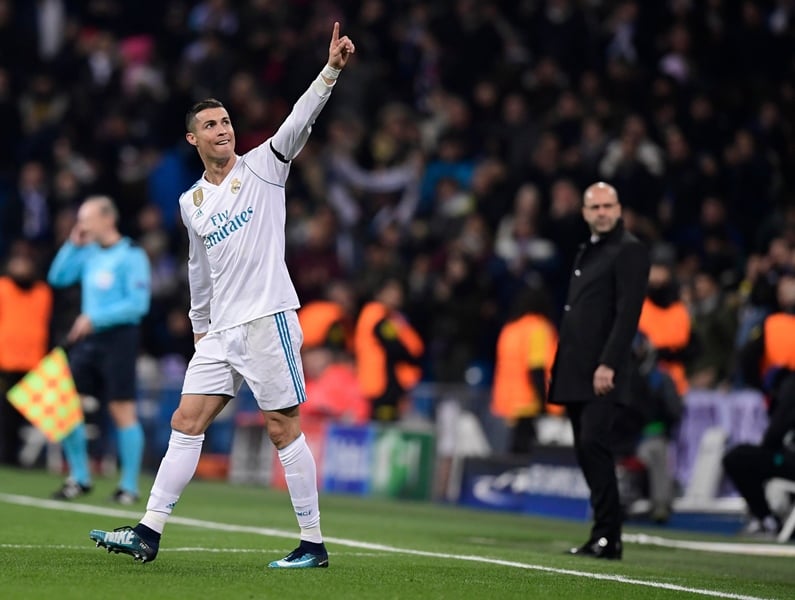 real madrid 039 s portuguese forward cristiano ronaldo celebrates a goal during the uefa champions league group h football match real madrid cf vs borussia dortmund at the santiago bernabeu stadium in madrid on december 6 2017 photo afp