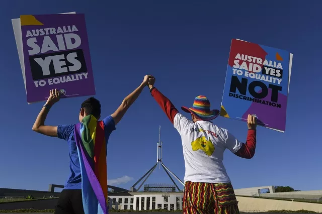 same sex marriage campaigners pose for pictures during an equality rally outside parliament house in canberra december 7 2017 photo via reuters same sex marriage campaigners pose for pictures during an equality rally outside parliament house in canberra december 7 2017 photo via reuters