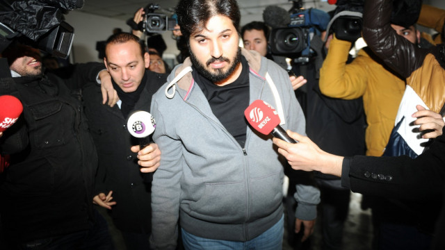 detained azerbaijani businessman reza zarrab is surrounded by journalists as he arrives at a police center in istanbul photo afp detained azerbaijani businessman reza zarrab is surrounded by journalists as he arrives at a police center in istanbul photo afp