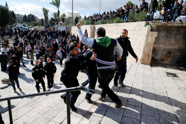 israeli policemen scuffle with a palestinian man during a protest following us president donald trump 039 s announcement that he has recognized jerusalem as israel 039 s capital near damascus gate in jerusalem 039 s old city photo reuters israeli policemen scuffle with a palestinian man during a protest following us president donald trump 039 s announcement that he has recognized jerusalem as israel 039 s capital near damascus gate in jerusalem 039 s old city photo reuters