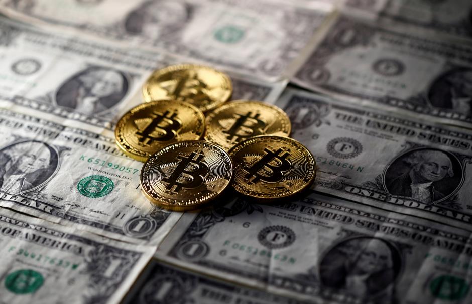 bitcoin virtual currency coins placed on dollar banknotes are seen in this illustration picture november 6 2017 photo reuters