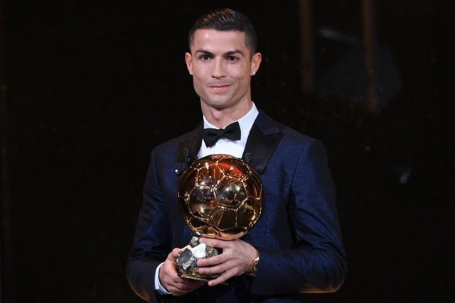 cristiano ronaldo poses with the 2017 ballon d 039 or france football trophy in paris photo afp cristiano ronaldo poses with the 2017 ballon d 039 or france football trophy in paris photo afp