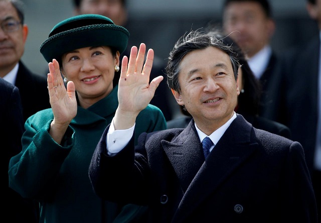 file photo japan 039 s crown prince naruhito r and and his wife crown princess masako wave as they send off emperor akihito and empress michiko boarding a special flight for their visit to vietnam and thailand at haneda airport in tokyo japan february 28 2017 photo reuters