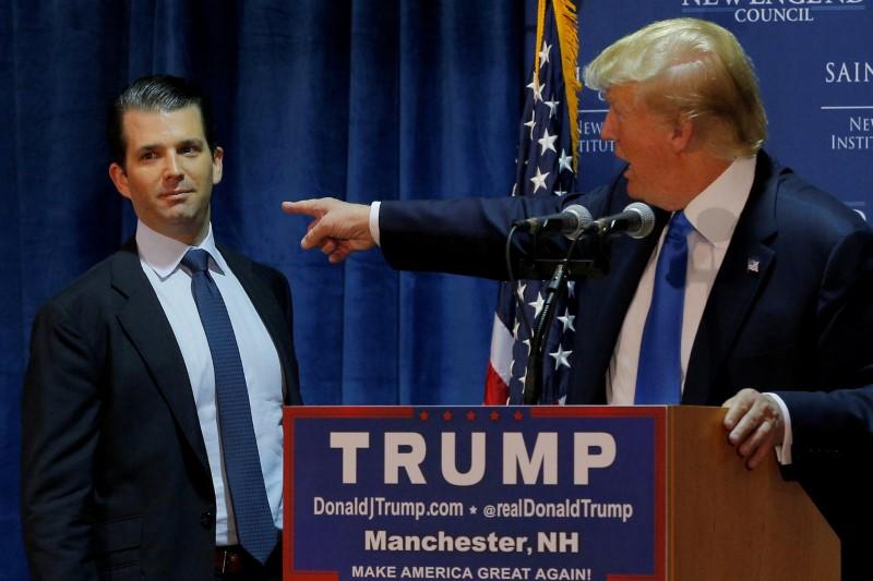 then u s republican presidential candidate donald trump r welcomes his son donald trump jr to the stage at one of the new england council 039 s quot politics and eggs 039 breakfasts in manchester new hampshire photo reuters