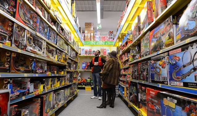 this file photo taken on december 12 2012 shows people shopping for christmas presents in a toy shop in chambray les tours photo afp