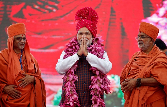 india 039 s prime minister narendra modi greets his supporters during an election campaign meeting ahead of gujarat state assembly elections in ahmedabad india december 3 2017 photo reuters