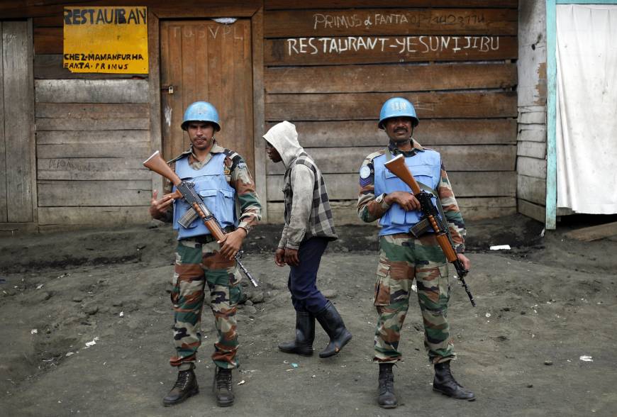 un soldiers stand guard in goma democratic republic of congo photo afp