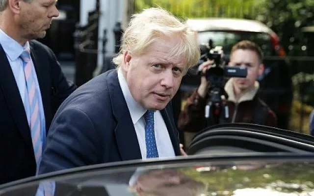 british foreign secretary boris johnson gets into a car as he leaves his home in london photo afp british foreign secretary boris johnson gets into a car as he leaves his home in london photo afp