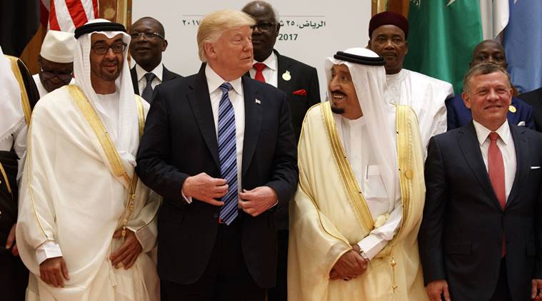 president donald trump talks with saudi king salman as they pose for photos with leaders at the arab islamic american summit at the king abdulaziz conference center photo afp