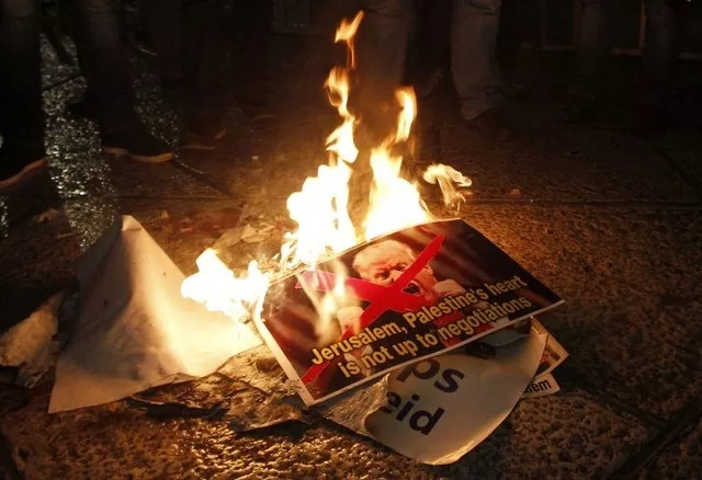 palestinian demonstrators burn posters of the us president in bethlehem 039 s manger square in protest to him declaring jerusalem as israel 039 s capital on december 6 2017 abbas said the united states can no longer play the role of peace broker after donald trump 039 s decision on wednesday to recognise jerusalem as israel 039 s capital photo afp palestinian demonstrators burn posters of the us president in bethlehem 039 s manger square in protest to him declaring jerusalem as israel 039 s capital on december 6 2017 abbas said the united states can no longer play the role of peace broker after donald trump 039 s decision on wednesday to recognise jerusalem as israel 039 s capital photo afp
