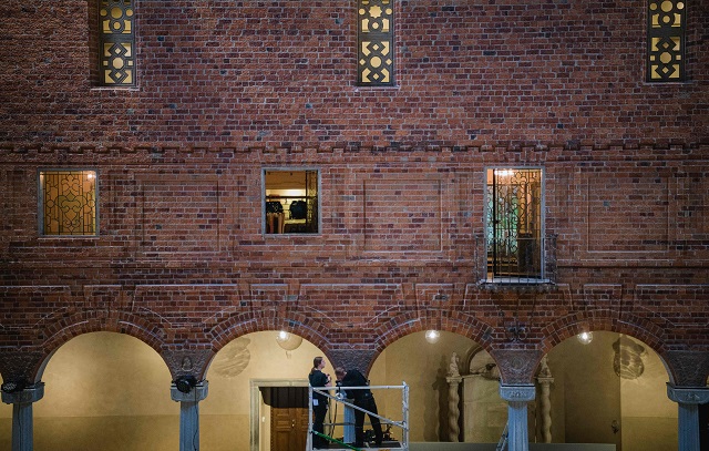 men work at stockholm city hall where preparations are under way for the 2017 nobel banquet photo afp