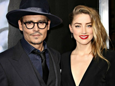 amber heard defends ex husband johnny depp
