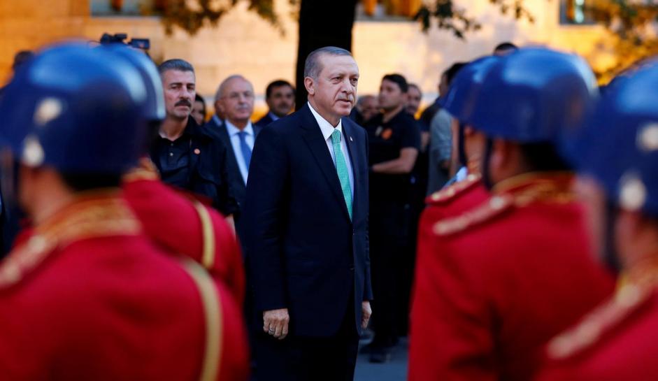 turkish president tayyip erdogan reviews a guard of honour as he arrives to the turkish parliament in ankara photo reuters