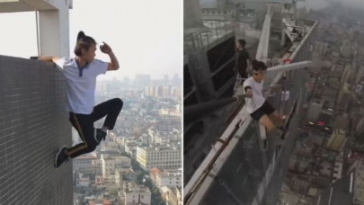 chinese rooftopper dies while attempting stunt on 62 storey building chinese rooftopper dies while attempting stunt on 62 storey building