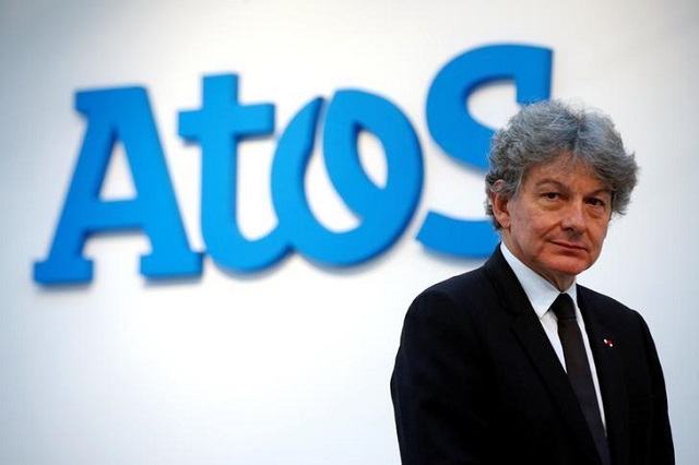 atos chairman and ceo thierry breton poses in front of the company 039 s logo during a presentation of the new bull sequana supercomputer in paris france april 12 2016 photo reuters