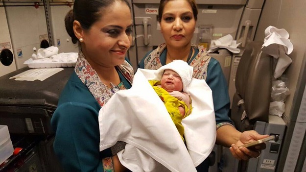 woman gives birth to baby girl during international flight on pia