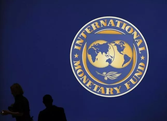 visitors are silhouetted against the logo of the international monetary fund imf in tokyo photo reuters visitors are silhouetted against the logo of the international monetary fund imf in tokyo photo reuters
