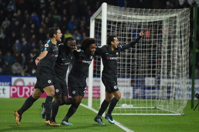 chelsea 039 s spanish midfielder pedro r celebrates with teammates after scoring their third goal during the english premier league football match between huddersfield town and chelsea at the john smith 039 s stadium in huddersfield northern england on december 12 2017 photo afp chelsea 039 s spanish midfielder pedro r celebrates with teammates after scoring their third goal during the english premier league football match between huddersfield town and chelsea at the john smith 039 s stadium in huddersfield northern england on december 12 2017 photo afp
