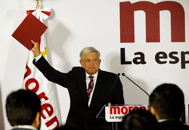 mexican presidential candidate andres manuel lopez obrador of the national regeneration movement morena shows a document during his registration as a pre candidate for morena for the july 2018 presidential election in mexico city mexico december 12 2017 photo reuters mexican presidential candidate andres manuel lopez obrador of the national regeneration movement morena shows a document during his registration as a pre candidate for morena for the july 2018 presidential election in mexico city mexico december 12 2017 photo reuters