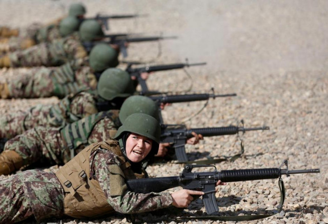 20 afghan women officers are being put through their paces at a military training academy in india photo reuters