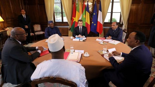 french president emmanuel macron c hosts a meeting with from l burkina faso s president roch marc christian kabore chadian president idriss deby malian president ibrahim boubacar keita mauritania s president mohamed ould abdel aziz and niger s president mahamadou issoufou ahead of a summit with leaders of the g5 sahel countries to discuss how to speed up the implementation of the g5 west african counter terrorism force at la celle saint cloud near paris on 13 december 2017 photo reuters