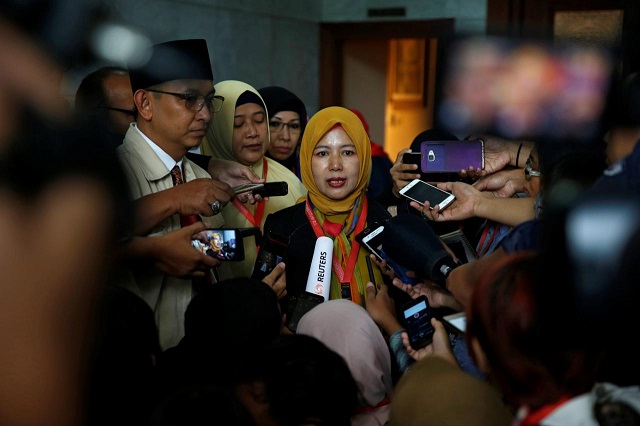 family love alliance aila speaker euis sunarti talks to reporters after attending a trial at indonesia 039 s constitutional court in jakarta indonesia december 14 2017 photo reuters